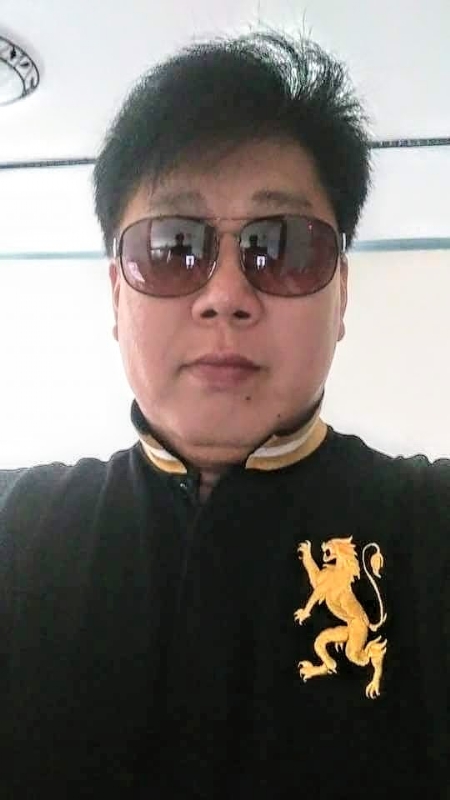 含笑半步癲的第二张照片--福建征婚网